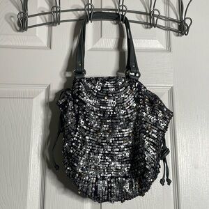 Jasper and jeera sequin drawstring tote purse